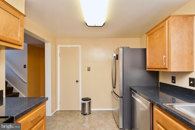 kitchen with sink and stainless steel dishwasher