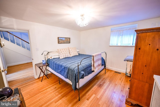 bedroom featuring light wood-type flooring