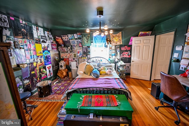 bedroom featuring hardwood / wood-style floors