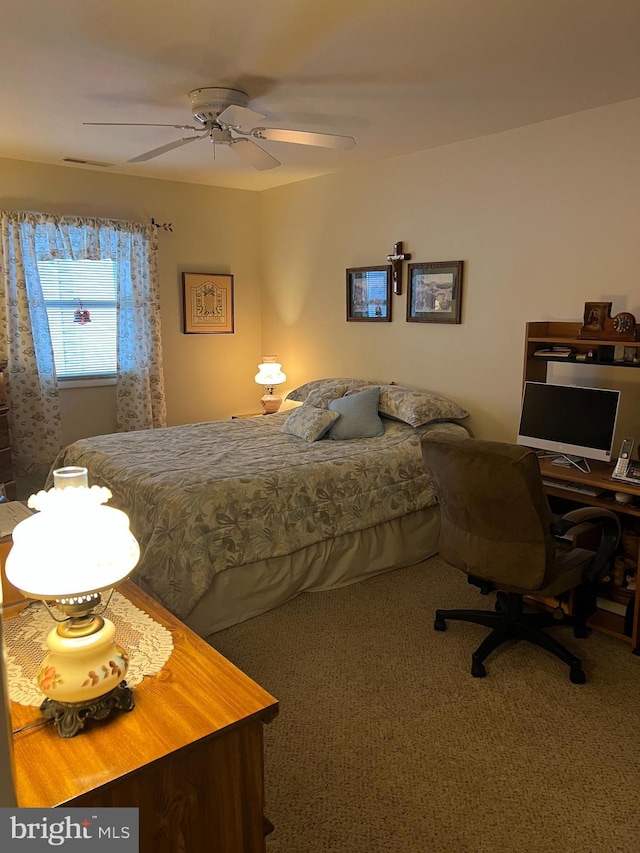 carpeted bedroom featuring ceiling fan