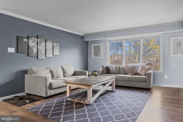 living room featuring crown molding and hardwood / wood-style flooring