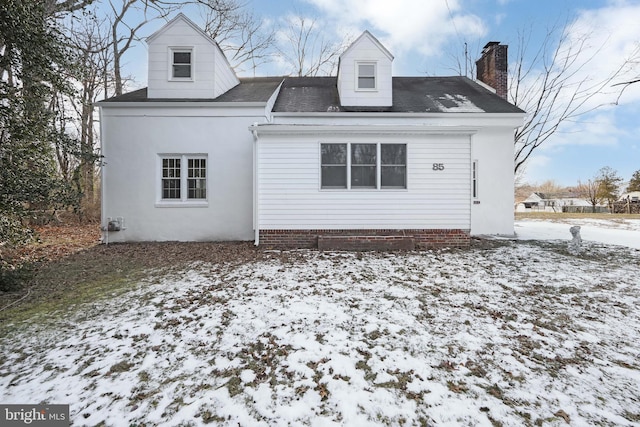 view of snow covered property