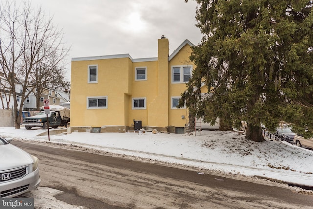 view of snow covered property