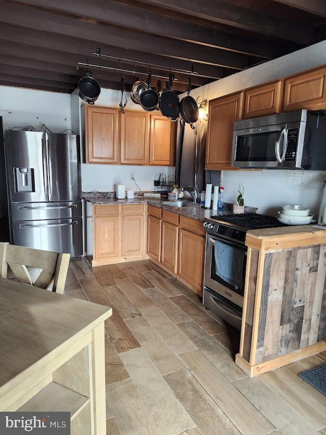 kitchen featuring sink and appliances with stainless steel finishes