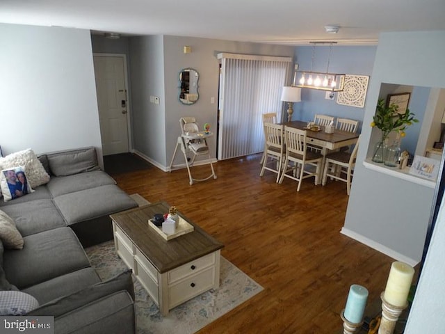 living room featuring dark hardwood / wood-style flooring