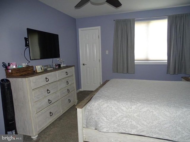 carpeted bedroom featuring ceiling fan