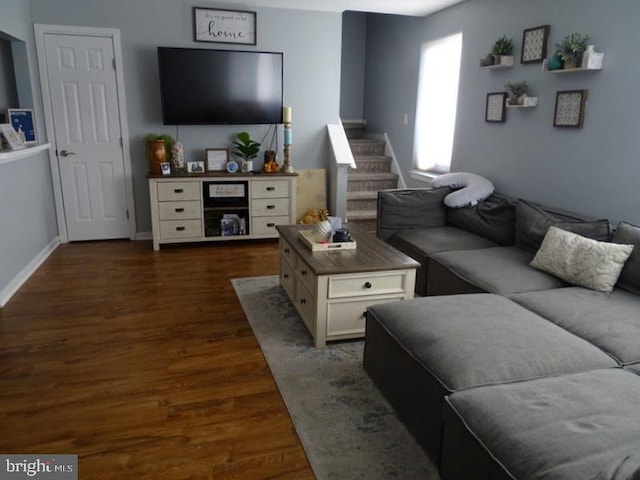 living room with dark wood-type flooring