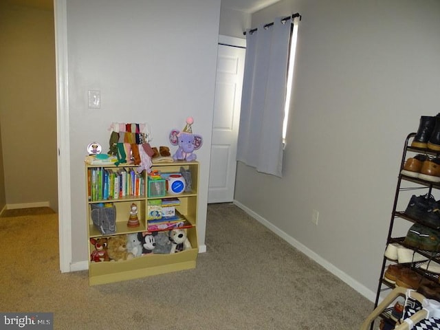 rec room with carpet flooring