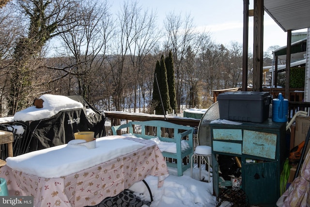 view of snow covered deck