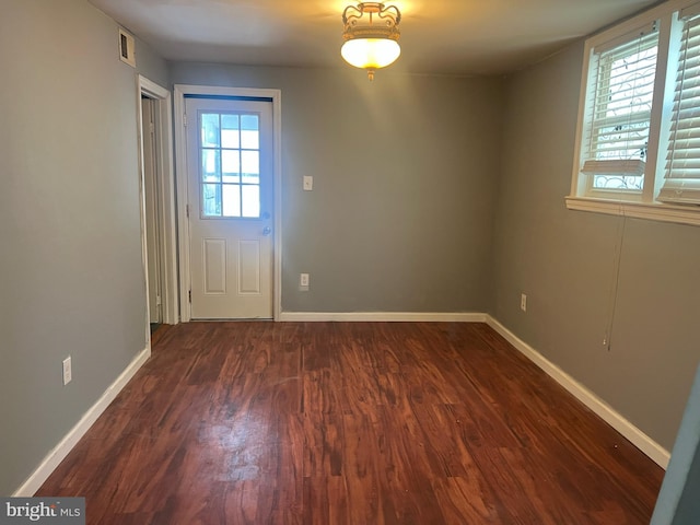 doorway featuring dark hardwood / wood-style flooring