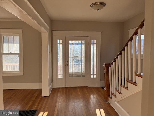 foyer with wood-type flooring