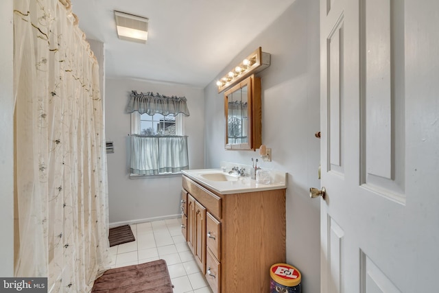 bathroom with vanity and tile patterned floors