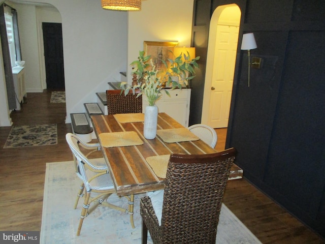 dining area featuring wood-type flooring