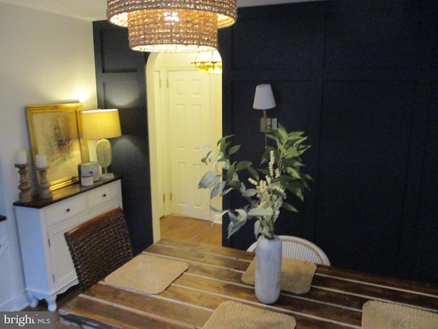 dining area with hardwood / wood-style flooring