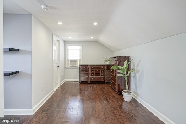 bonus room with dark wood-type flooring, cooling unit, and lofted ceiling