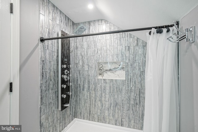 bathroom with curtained shower