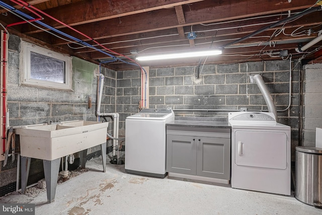 laundry room with washer and dryer