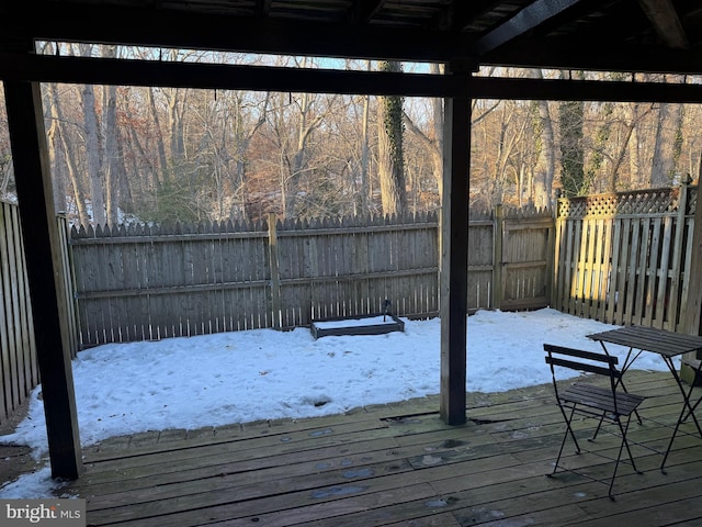 view of snow covered deck