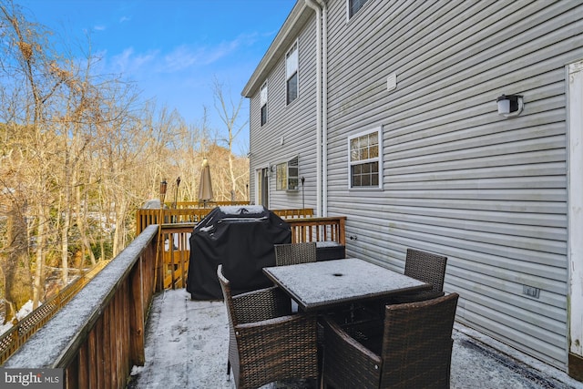 wooden terrace with area for grilling