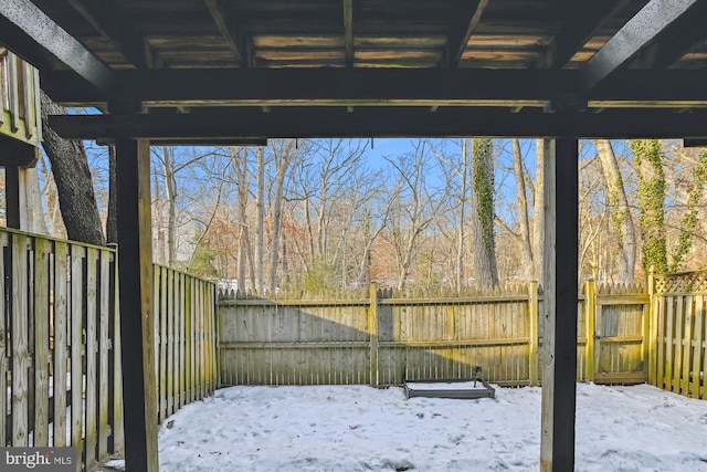 view of yard layered in snow