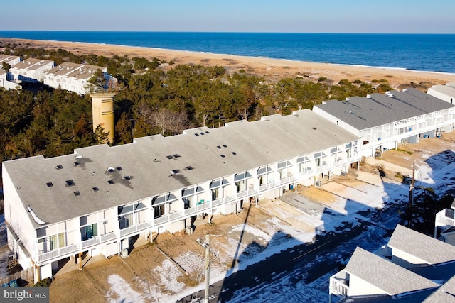 bird's eye view with a water view and a view of the beach