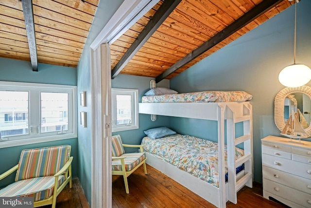 bedroom with wood ceiling, dark wood-type flooring, and lofted ceiling with beams