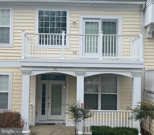 property entrance with a balcony