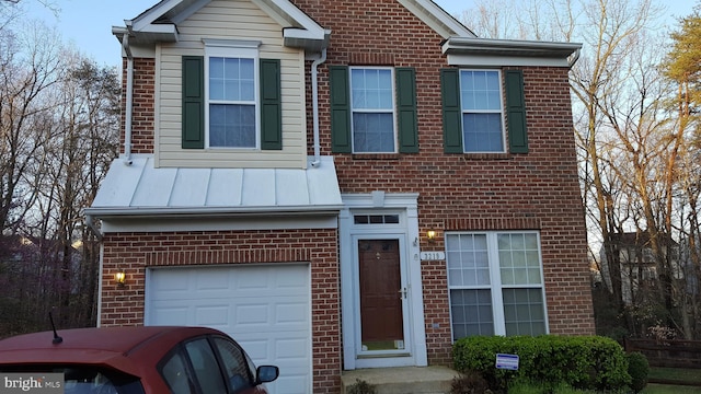 view of front of home with a garage