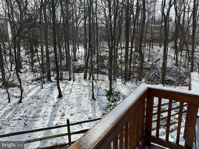 view of snow covered deck