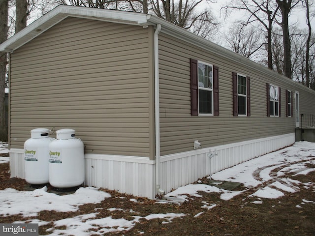 view of snow covered property