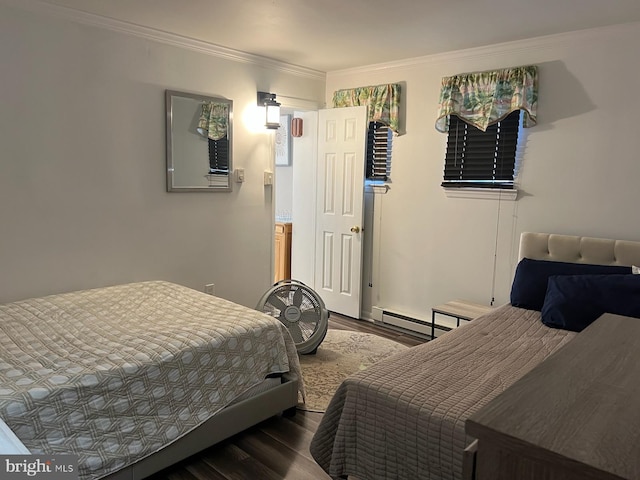 bedroom featuring wood-type flooring and ornamental molding