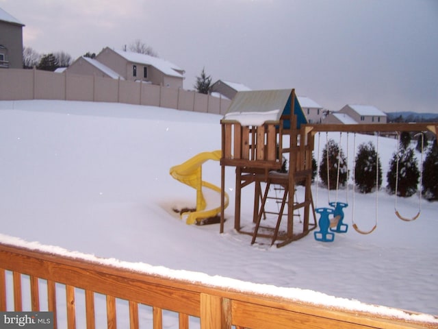 view of snow covered playground