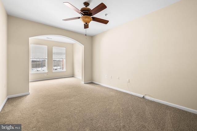 unfurnished room with carpet floors and ceiling fan