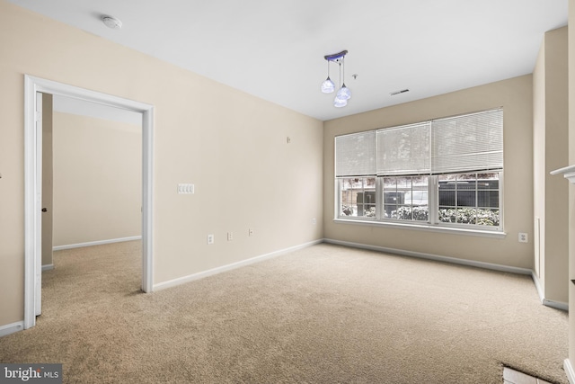 view of carpeted spare room