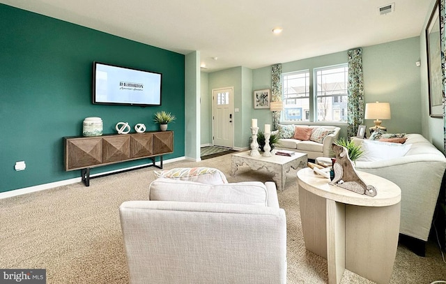 living room with light colored carpet