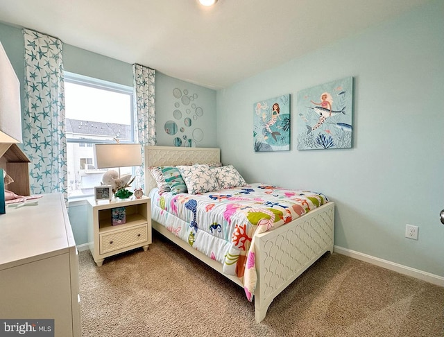 bedroom featuring light colored carpet