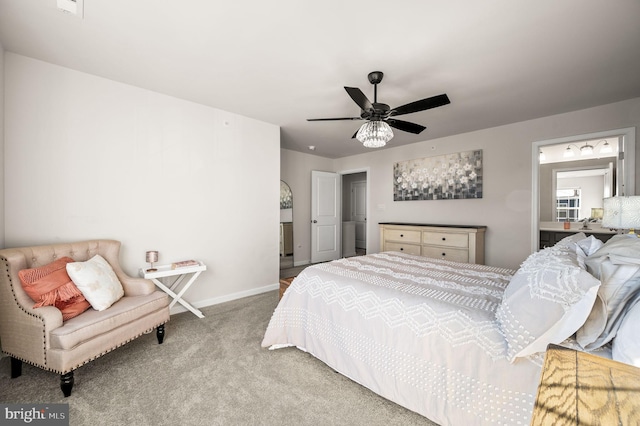 bedroom with ceiling fan and light carpet