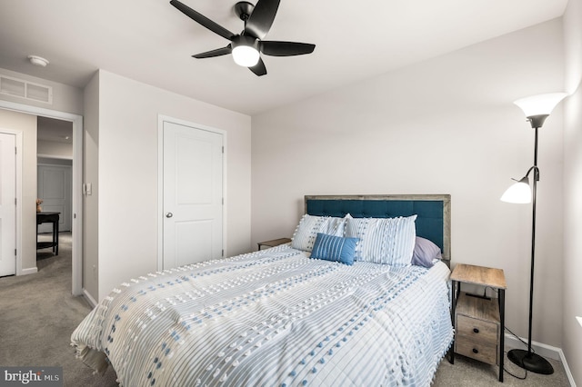 bedroom with light carpet and ceiling fan