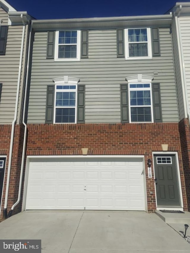 view of property with a garage