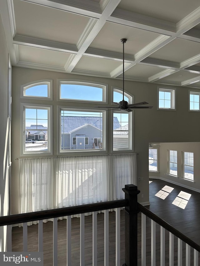 room details featuring ceiling fan, crown molding, beam ceiling, and coffered ceiling