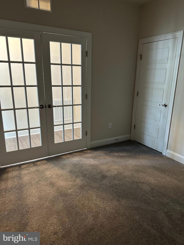 interior space featuring french doors and carpet floors