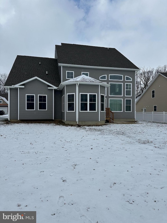 view of snow covered house