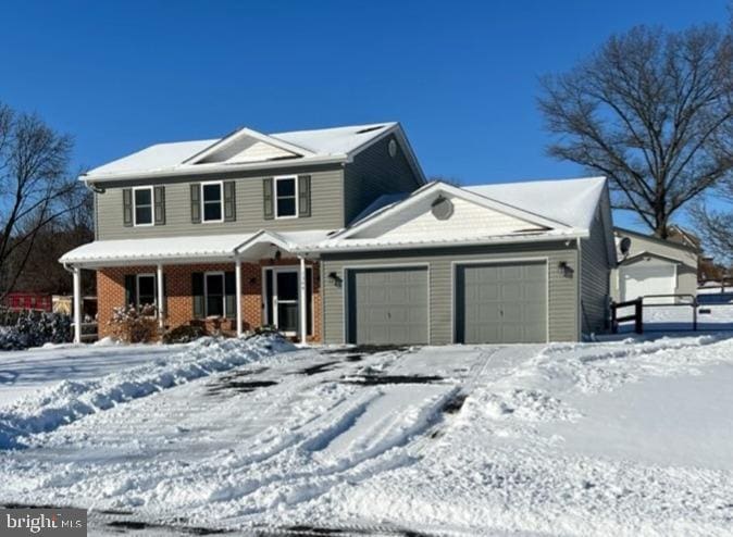 view of front of home with a garage