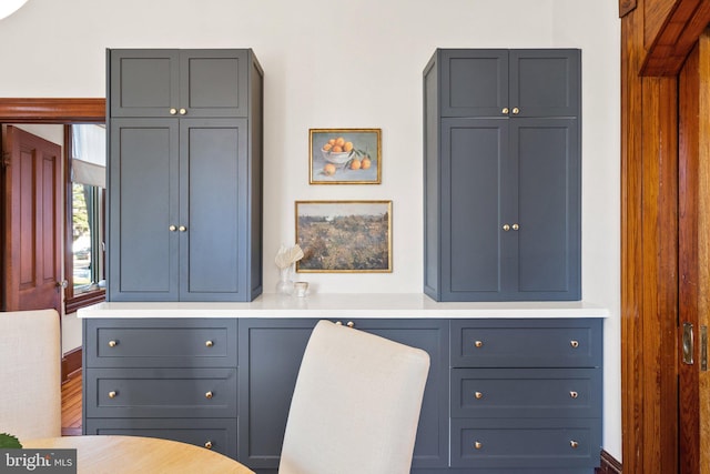 office area with hardwood / wood-style floors