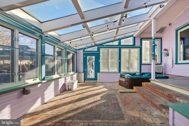 sunroom / solarium with a skylight