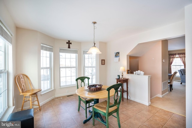 dining room with light tile patterned flooring