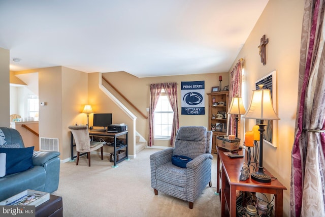 home office with light colored carpet