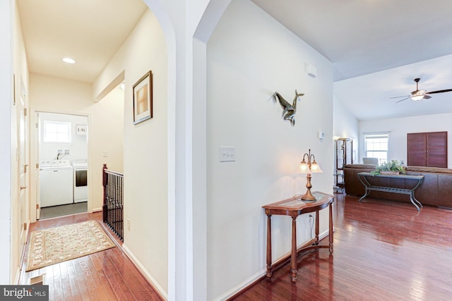 hall featuring washer and clothes dryer and dark hardwood / wood-style flooring