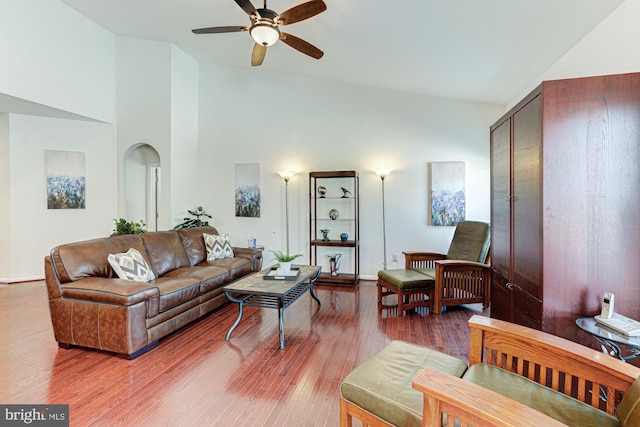 living room with ceiling fan and hardwood / wood-style floors