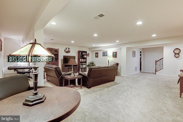 living room with light colored carpet